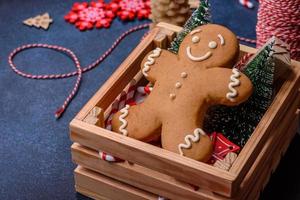 Christmas composition made of christmas decoration on a dark background. photo