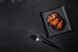 Dolma, stuffed grape leaves with rice and meat on a dark background photo