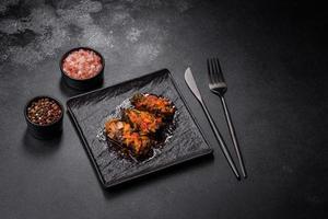 Dolma, stuffed grape leaves with rice and meat on a dark background photo