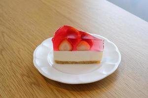 strawberry jelly cheesecake on white plate.Homemade bakery concept. photo