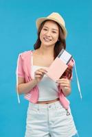 Happy woman holding passport isolated portrait of smiling girl. photo