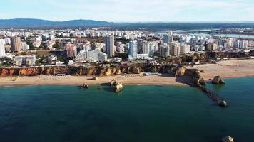 Aerial view of a beach and Portico city from sea video