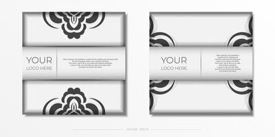 Two black and white business cards with a black and white pattern vector