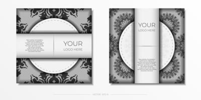 Vector preparation of invitation card with vintage patterns.Stylish template for printable design postcard in white color with luxury greek