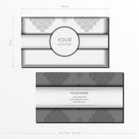 Vector Business card template in white color with gorgeous vector patterns with mandala patterns. Print-ready business card design with monogram ornament.