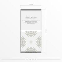 A business card with a white background and a gold pattern vector
