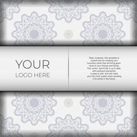 A business card with a floral pattern vector