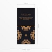 A black and gold business card with an ornate pattern vector