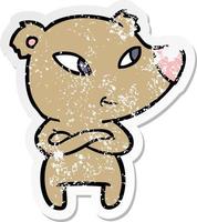 distressed sticker of a cute cartoon bear with crossed arms vector