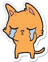 sticker of a crying cartoon cat vector