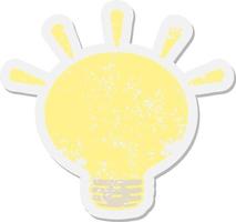 shining light bulb grunge sticker vector