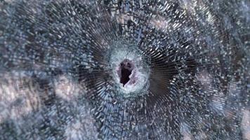 Bullet holes in the windshield of a car. Auto insurance. A car of civilians, with a broken windshield, damaged by shelling. Victims of the Russian full-scale invasion of the territory of Ukraine. video