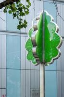 London, UK, 2014. Artificial tree outside a building near City Hall photo
