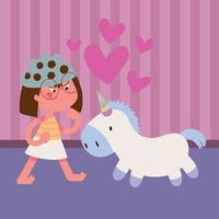 niña jugando con unicornio vector