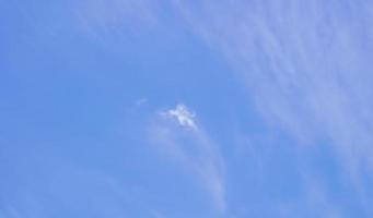 blue sky background with small clouds in panoramic view. photo