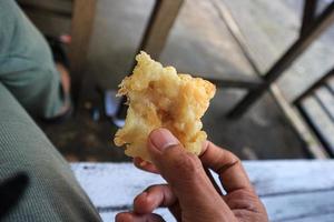 indonesian Fried food. ften referred to as Gorengan. Because it is deep fried, this fried food is also called Gorengan Krispi. Traditional food from Indonesia which is crunchy and savory. photo