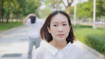 Asian girls are stalked by men. video