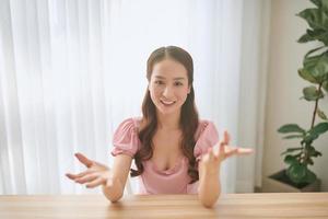 Asian Female Vlogger Recording Broadcast At Home photo