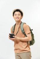 young handsome man tourist with  camera in hands isolated photo