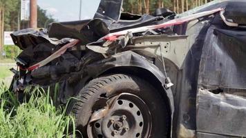 Car after an accident on the side of the road. Frontal and side impact. Life insurance. An accident without the possibility of recovery. Damage after an accident. Ukraine, Irpin - May 12, 2022. video