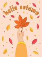 Hello autumn Sleeve in a sweater holding an autumn leaf vector