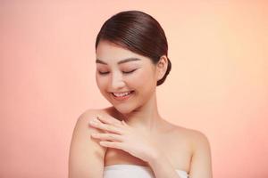 Beautiful Young Asian Woman with Clean Fresh Skin photo