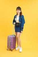 Full length body size photo of cute girlfriend ready to get on plane while isolated with vivid background