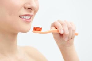 White Teeth with toothbrush. Dental health background photo