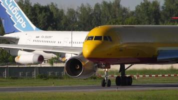 NOVOSIBIRSK, RUSSIAN FEDERATION JUNY 12, 2022 - Cargo aircraft Tu 204 of AviaStar on the runway before take off at Tolmachevo Airport, Novosibirsk OVB. Transport airline, cargo transportation video