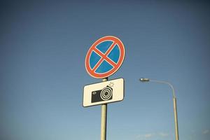 Sign of shooting on road. Warning about cameras on highway. photo