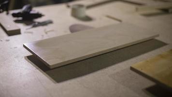 Board on table. Details of carpentry workshop. Wood processing. photo