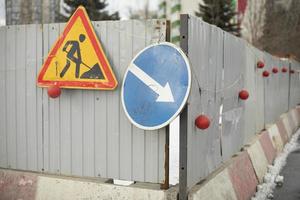 Place of construction. Building signs on fence. Place of fencing. photo