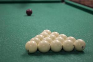 Game of billiards. White balls for cue strike. Sports competition. photo