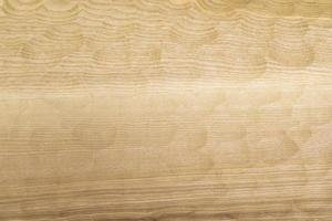 Wooden texture. Light board. Treated surface of monolithic bar. photo