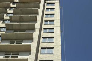 Windows in new house. Construction of residential complex. Building is made of concrete. Architecture details. photo