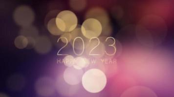 2023 feliz año nuevo texto dorado con bokeh video