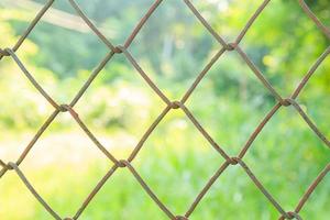 Wire fence and blurred background photo