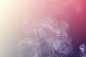 colored smoke isolated on white background photo