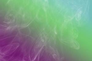 colored smoke isolated on white background photo