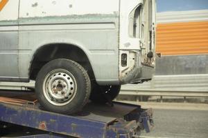 Car on banner. Evacuation of transport. photo