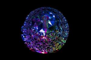 Colored ball in dark. Light music. Decoration of color. photo