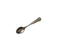 Silver empty coffee spoon isolated object on the white background, kitchen cooking utensils for tea or coffee ceremony, delicate ancient tableware, cutlery, top view photo