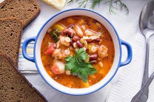 Italian Minestrone Soup in the plate top view photo