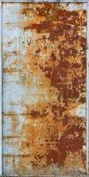 Rust on an old sheet of metal texture painted with gray paint and framed. photo