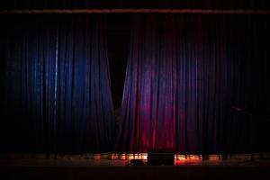 Curtain on stage. Closing curtain after performance. photo