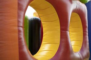 Inflatable design. Children's area. Trampoline in play park. photo