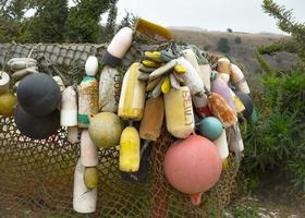 Colorful Vintage Buoys by the Sea photo