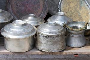 Old traditional cooking cups photo