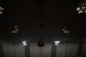 Lamps in interior. Light in room. Ceiling in apartment. photo