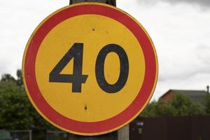 Road sign with number 40. Limiting modestness of movement. Details of transport designation. photo